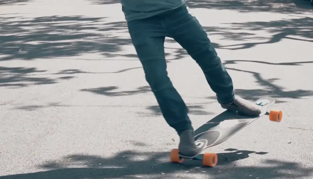 how to do a trick on a longboard