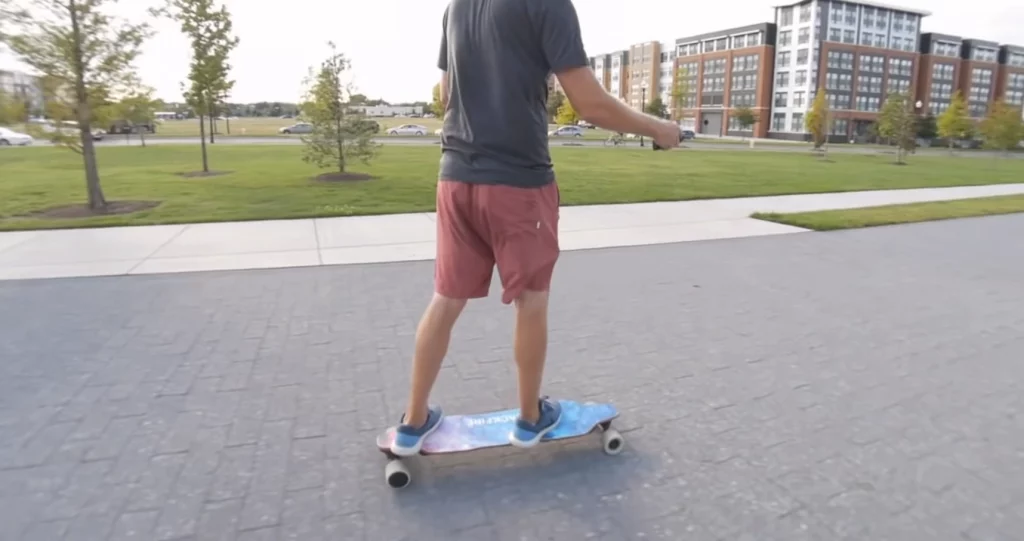 a person riding electric skateboard