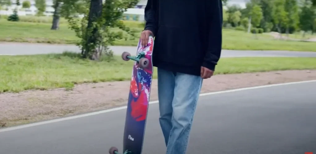 a man with loong boards

