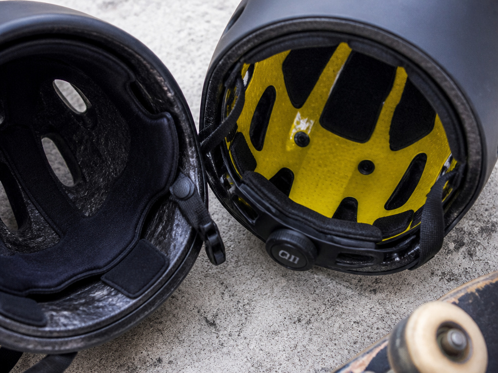 Comparison of a basic skate helmet versus a MIPS helmet with a dial-fit system.